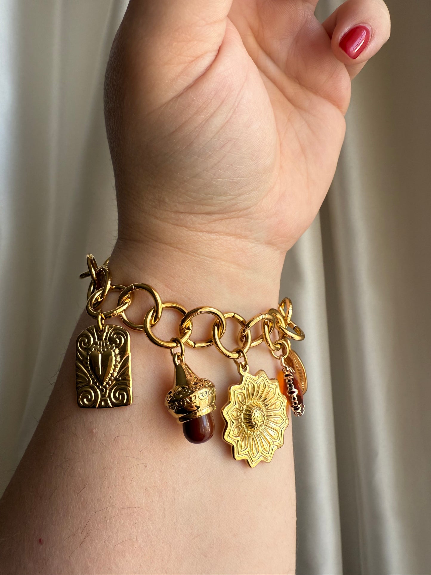 Bracciale ambra charms